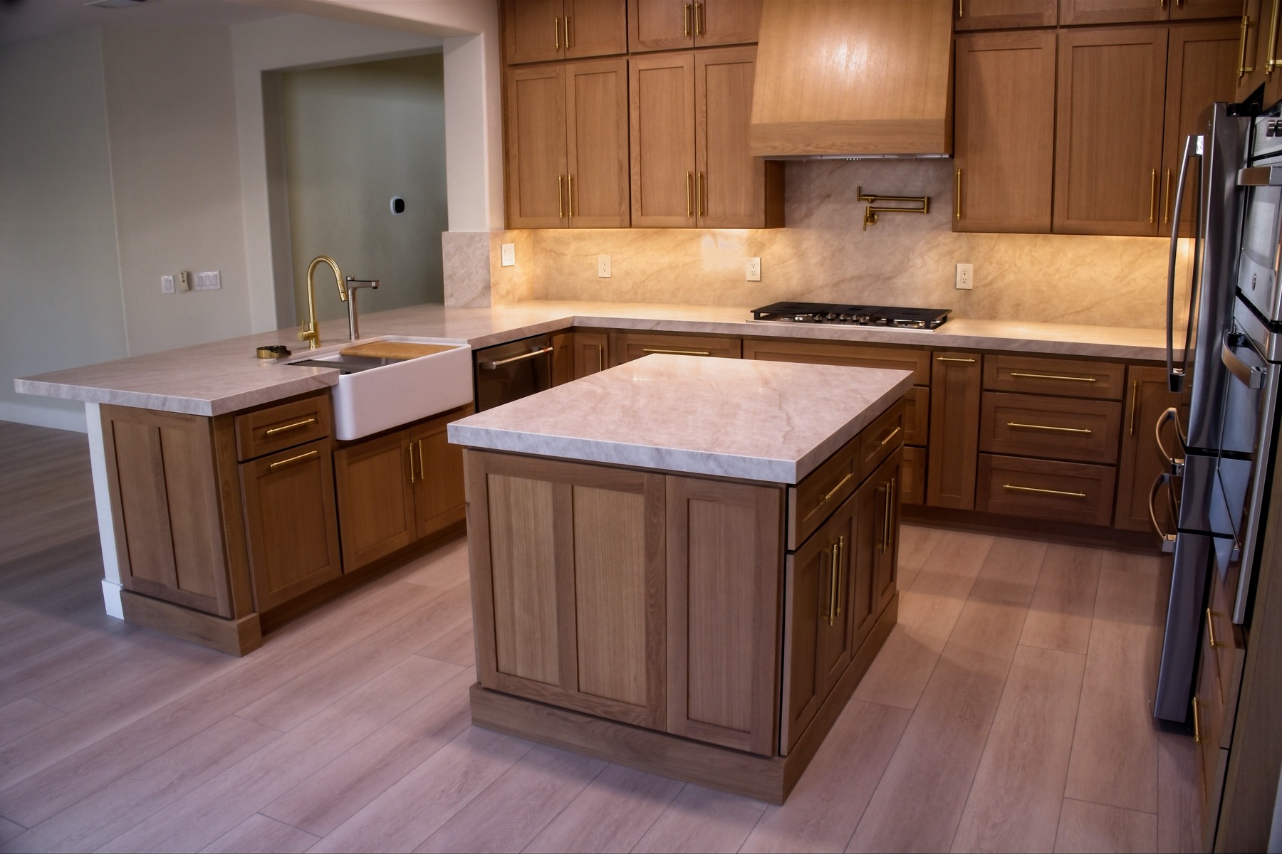 Kitchen after — custom cabinetry and new island